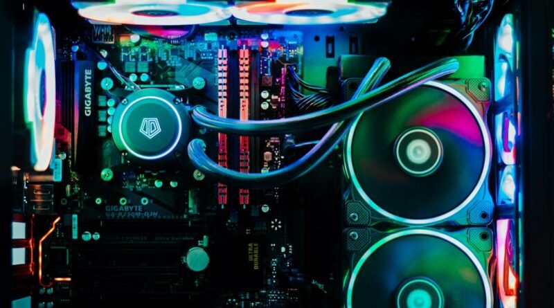 a close up of a computer motherboard in a dark room